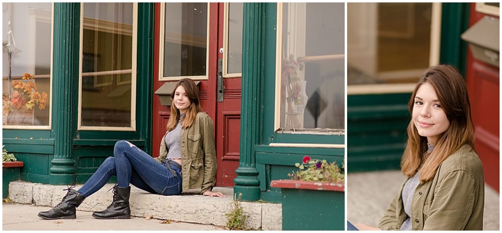 girl senior pictures in front of green building